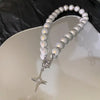 Y2K Pearl Beads Cross Necklace by Lyons way | Online Handpicked Vintage Clothing Store - available on lyonsway.com for 17.10 . Perfect for cross,jewelry,necklace,pearl .
