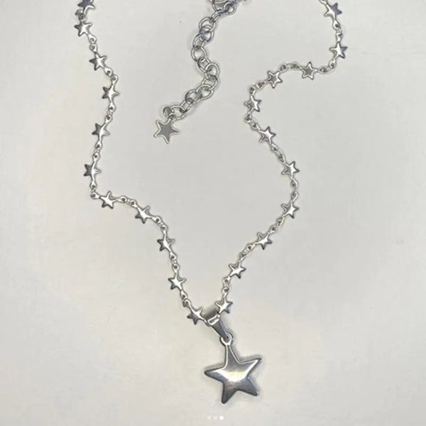 Y2K Star Necklace by Lyons way | Online Handpicked Vintage Clothing Store - available on lyonsway.com for 18.79 . Perfect for accessories,gifts .