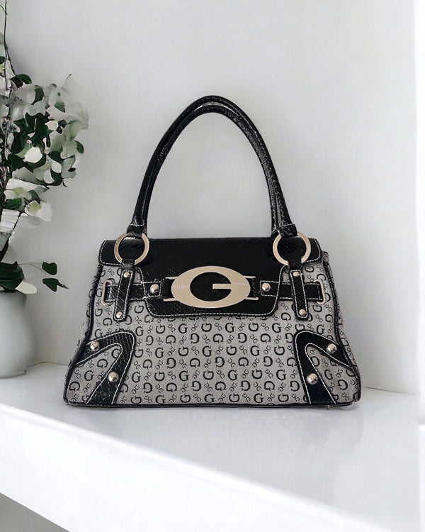 Vintage Guess Bag Monogram by Lyons way | Online Handpicked Vintage Clothing Store - available on lyonsway.com for 84.95 . Perfect for GREY, GUESS, €75-€100 .