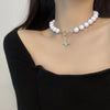 Y2K Pearl Beads Cross Necklace by Lyons way | Online Handpicked Vintage Clothing Store - available on lyonsway.com for 17.10 . Perfect for cross,jewelry,necklace,pearl .