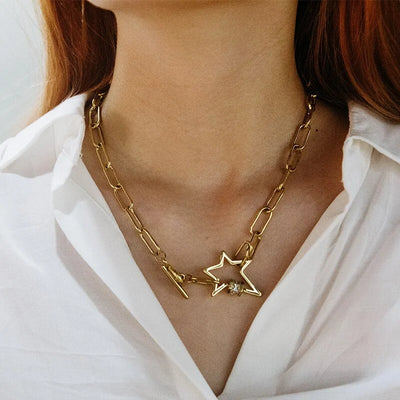 Y2K Stainless Steel Gold Toggle Star Necklace by Lyons way | Online Handpicked Vintage Clothing Store - available on lyonsway.com for 23.92 . Perfect for .