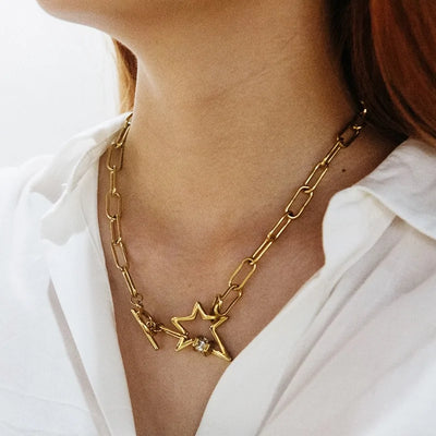 Y2K Stainless Steel Gold Toggle Star Necklace by Lyons way | Online Handpicked Vintage Clothing Store - available on lyonsway.com for 23.92 . Perfect for .