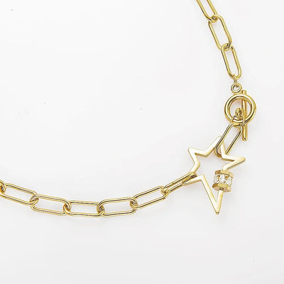 Y2K Stainless Steel Gold Toggle Star Necklace by Lyons way | Online Handpicked Vintage Clothing Store - available on lyonsway.com for 23.92 . Perfect for .