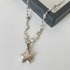 Y2K Star Necklace by Lyons way | Online Handpicked Vintage Clothing Store - available on lyonsway.com for 18.79 . Perfect for accessories,gifts .