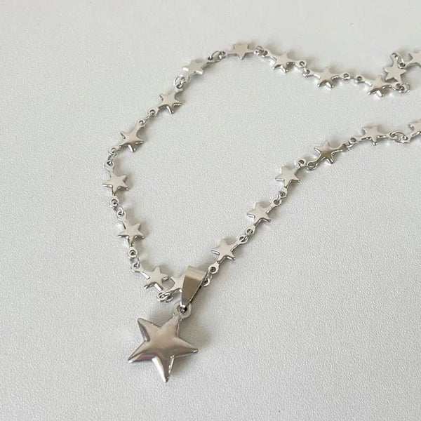 Y2K Star Necklace by Lyons way | Online Handpicked Vintage Clothing Store - available on lyonsway.com for 18.79 . Perfect for accessories,gifts .