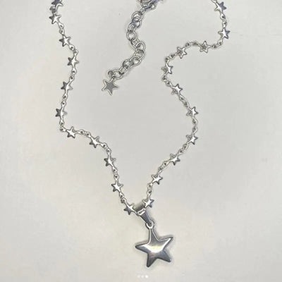 Y2K Star Necklace by Lyons way | Online Handpicked Vintage Clothing Store - available on lyonsway.com for 18.79 . Perfect for accessories,gifts .